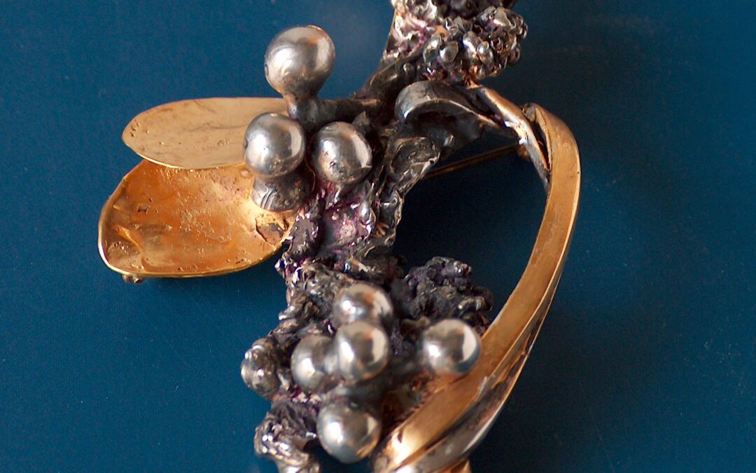 spilla argento oro
